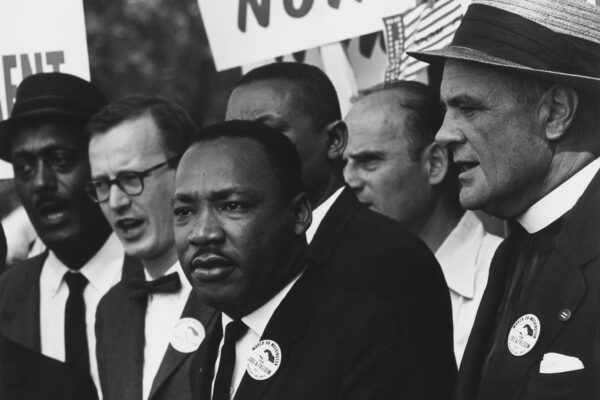 Civil_Rights_March_on_Washington_D.C._Dr._Martin_Luther_King_Jr._and_Mathew_Ahmann_in_a_crowd._-_NARA_-_542015_-_Restoration.jpg