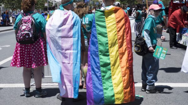 Rainbow-and-Transgender-Flags-around-Necks.jpg