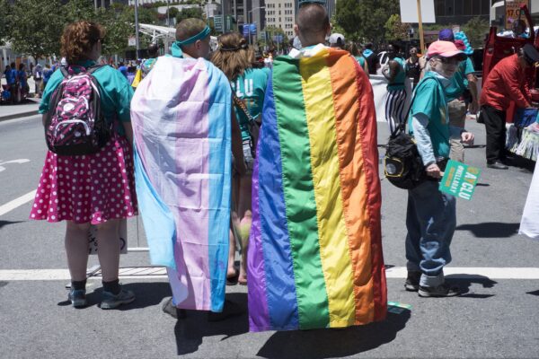 Rainbow-and-Transgender-Flags-around-Necks.jpg
