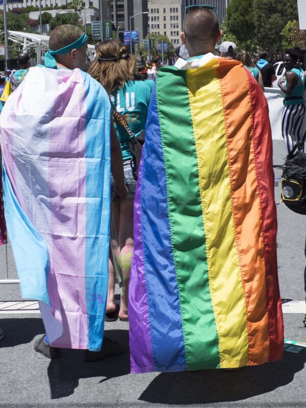 Rainbow-and-Transgender-Flags-around-Necks.jpg