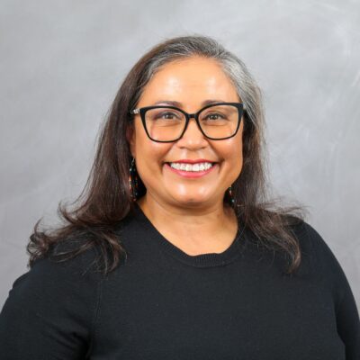 Photo of Norma smiling at camera