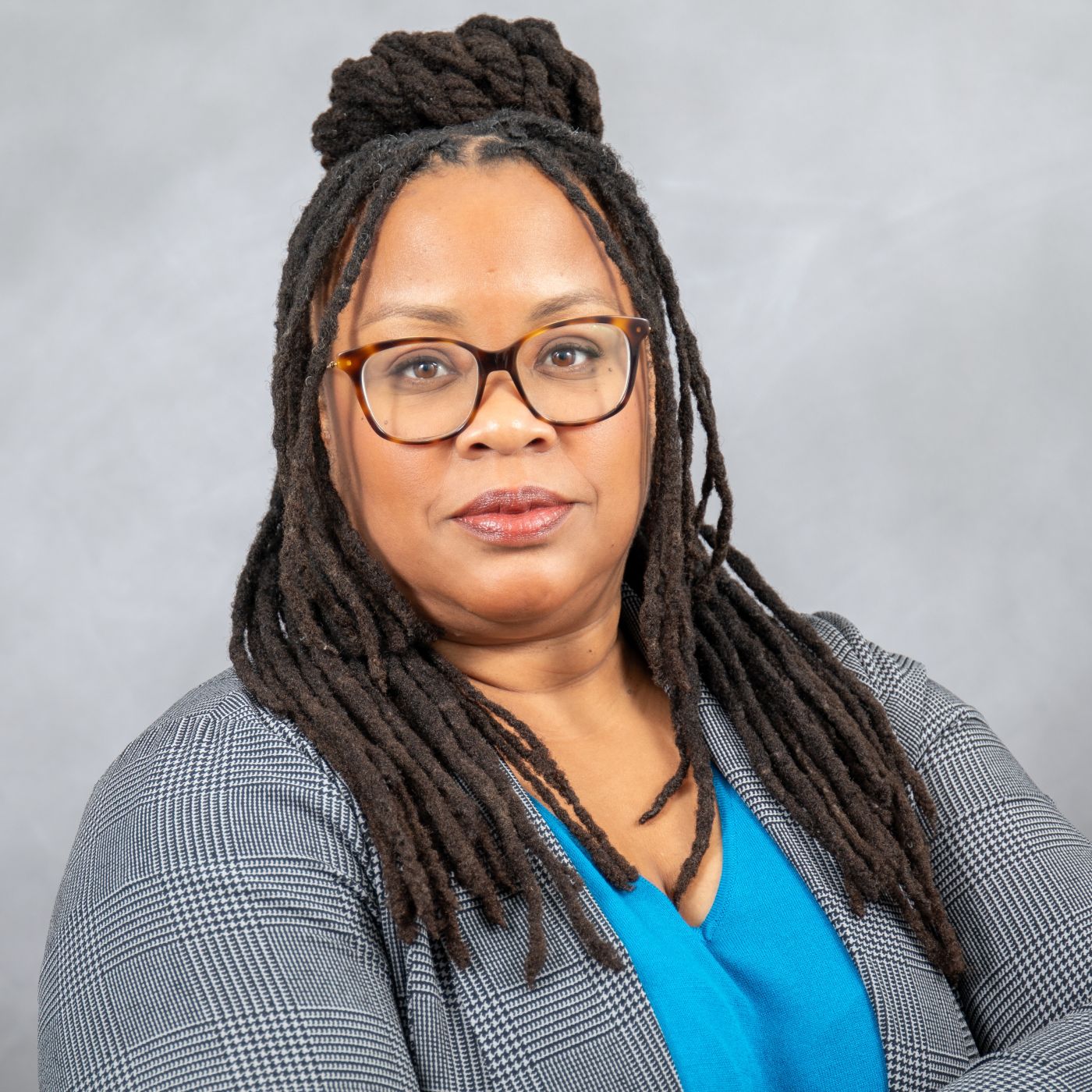 Photo of Christie looking at the camera