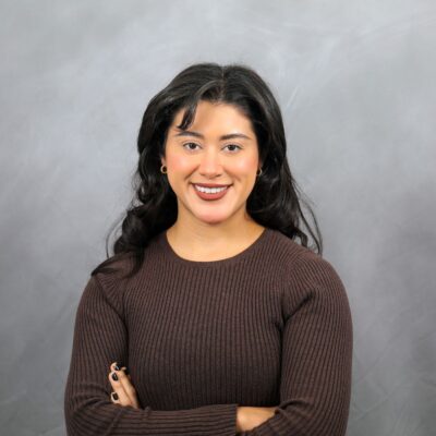 Photo of Marisol smiling at camera