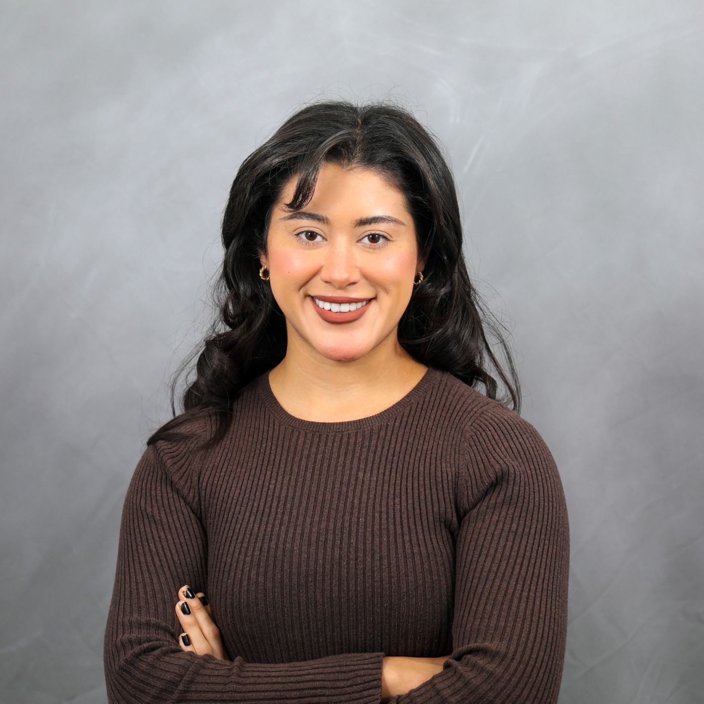 Photo of Marisol smiling at camera