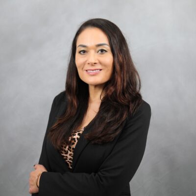 Photo of Jules smiling at the camera