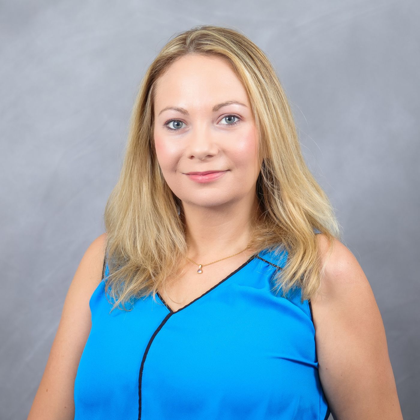 Photo of Caitlyn smiling at camera