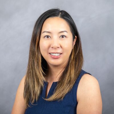 Photo of Eva smiling at the camera