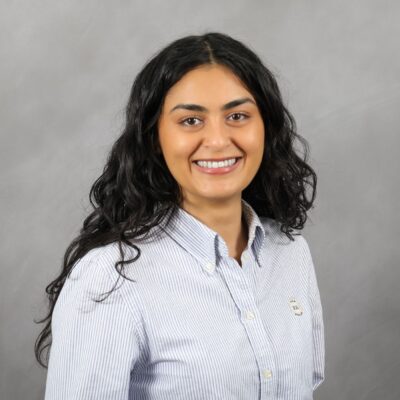 Photo of Alejandra smiling at the camera