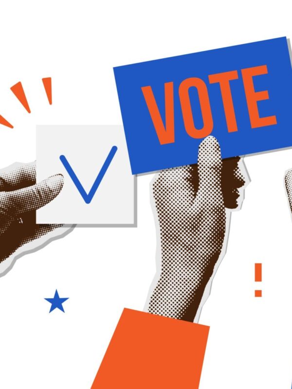 3 paper cut out hands- one holding a check box, one holding a card that says vote, one doing a peace sign